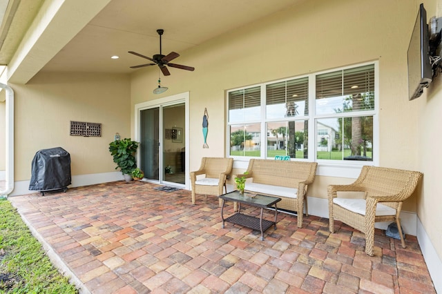 view of patio with ceiling fan and an outdoor hangout area