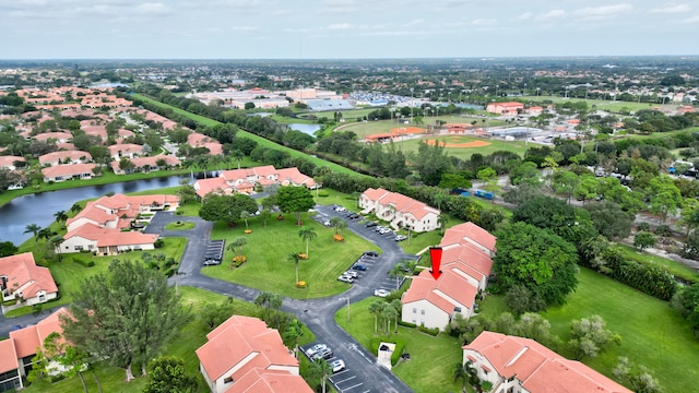 bird's eye view with a water view