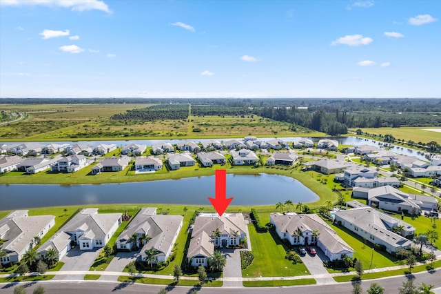 drone / aerial view featuring a water view