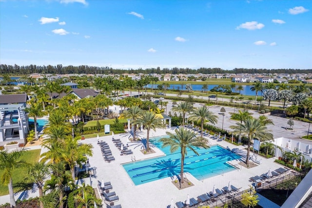 birds eye view of property featuring a water view