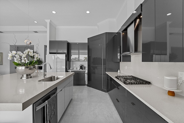 kitchen with stainless steel gas cooktop, crown molding, light stone countertops, and sink