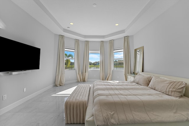 bedroom featuring a tray ceiling