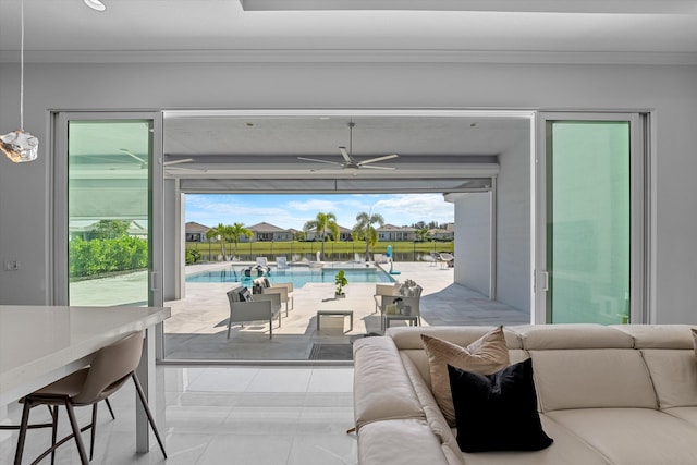 view of patio with a fenced in pool and ceiling fan