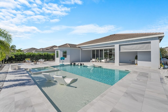 view of pool featuring a patio area