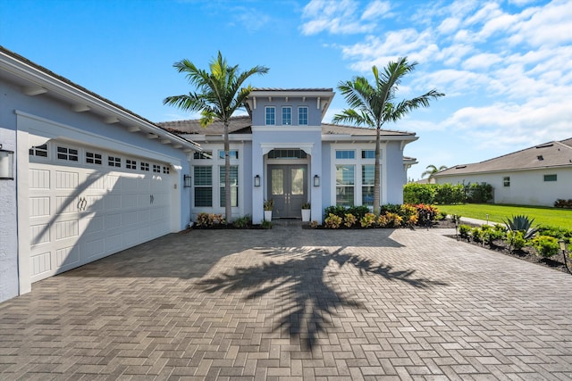 view of front of home with a garage