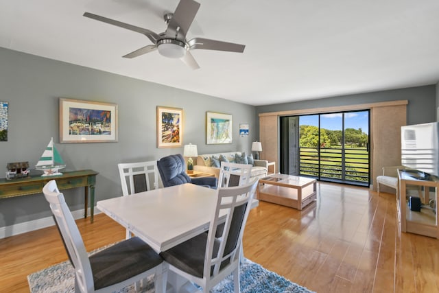 dining room featuring hardwood / wood-style flooring and ceiling fan