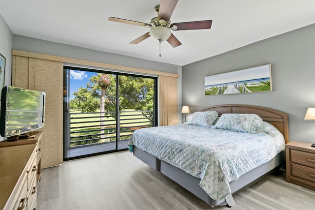 bedroom with access to exterior, light hardwood / wood-style floors, and ceiling fan