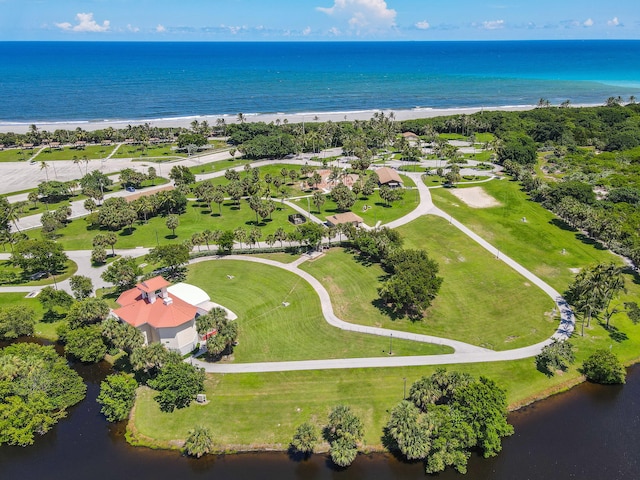 bird's eye view featuring a view of the beach and a water view