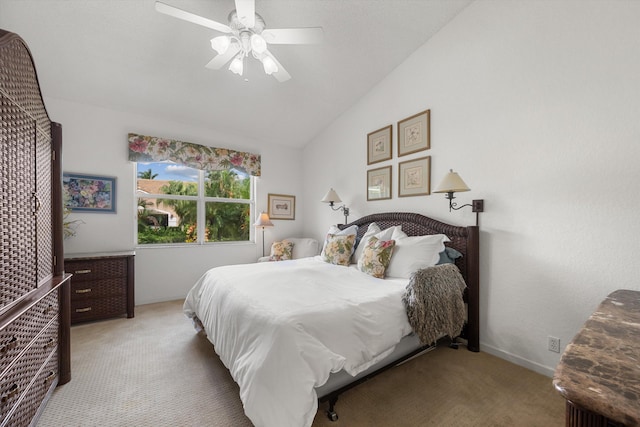 carpeted bedroom featuring ceiling fan and lofted ceiling