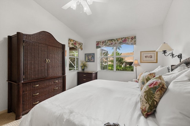 bedroom with ceiling fan and vaulted ceiling