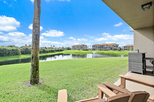 view of yard with a water view