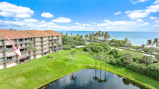 drone / aerial view with a water view