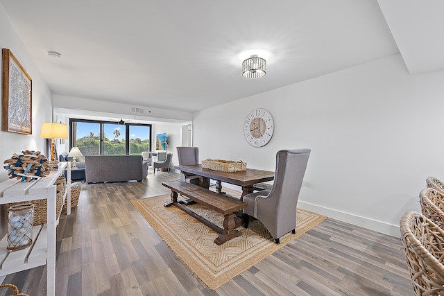 dining area featuring hardwood / wood-style flooring