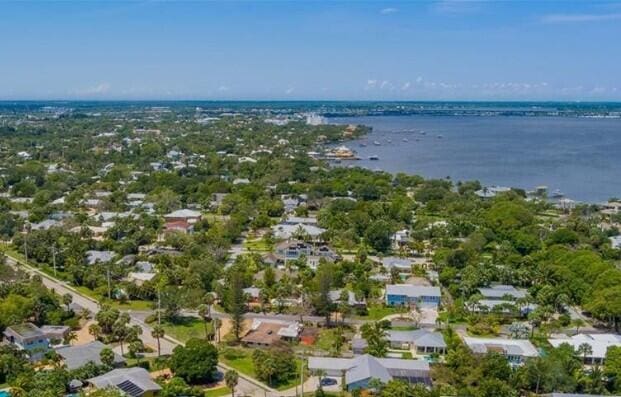 drone / aerial view with a water view