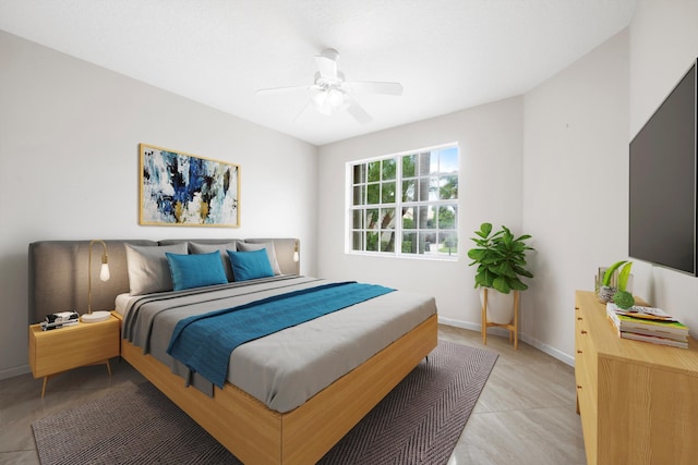 bedroom featuring ceiling fan and light tile patterned floors