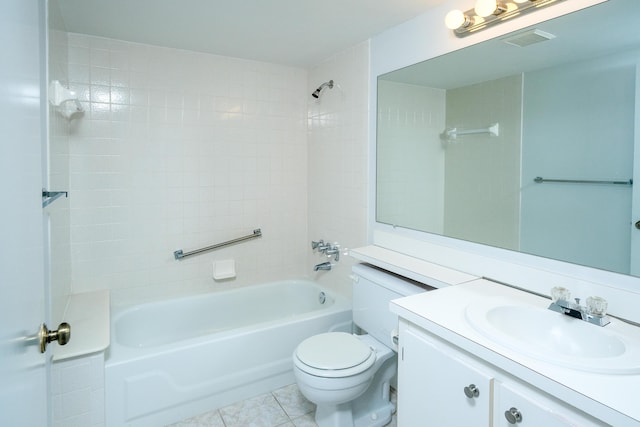 full bathroom featuring tile patterned flooring, toilet, vanity, and bathing tub / shower combination