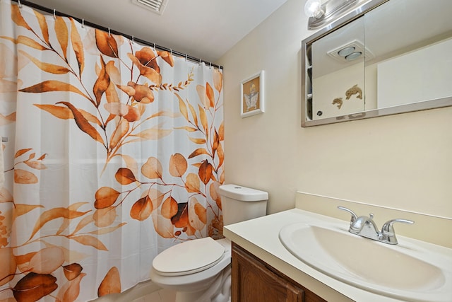 bathroom with toilet, curtained shower, visible vents, and vanity