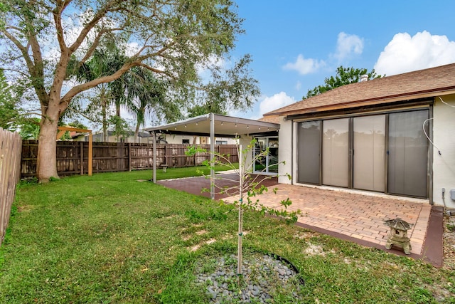 view of yard with a patio area