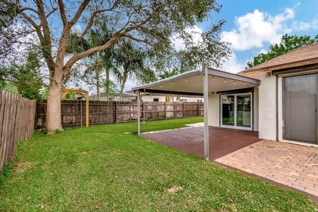 view of yard featuring a patio