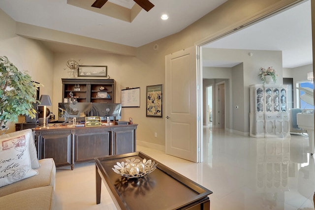 tiled home office with ceiling fan