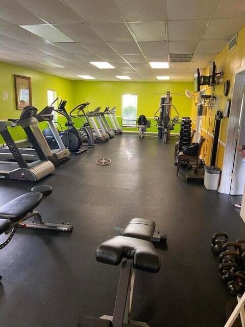 gym with a drop ceiling