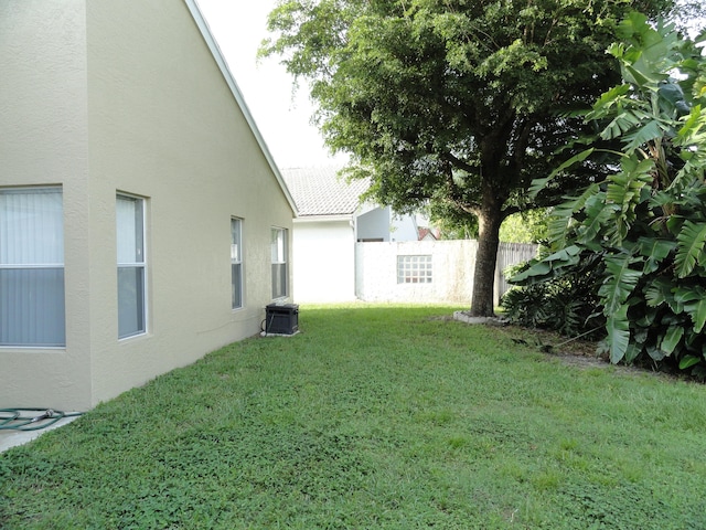 view of yard with central AC unit