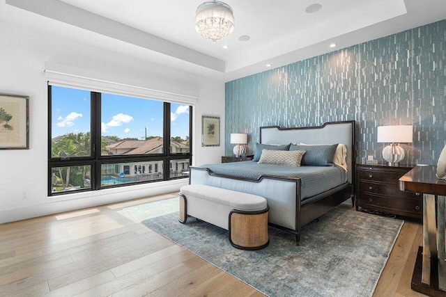 bedroom with wood-type flooring