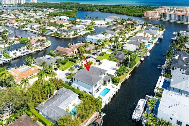 bird's eye view with a water view