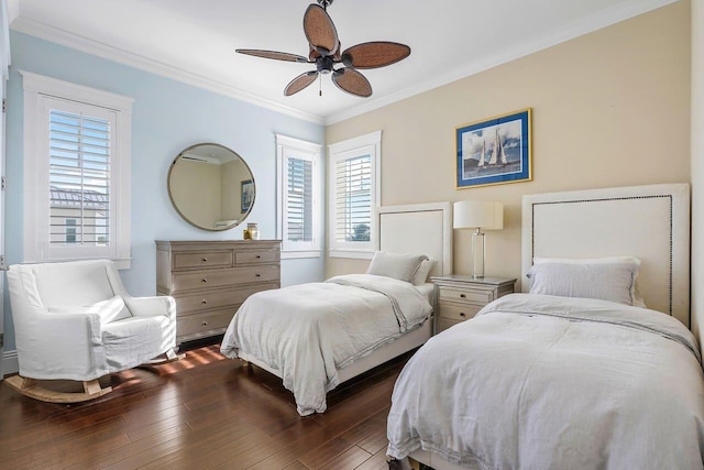 bedroom featuring multiple windows, ceiling fan, and dark hardwood / wood-style floors