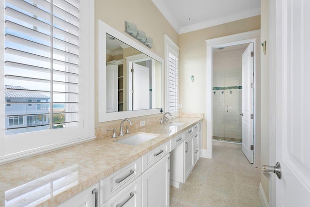 bathroom featuring vanity, an enclosed shower, and crown molding