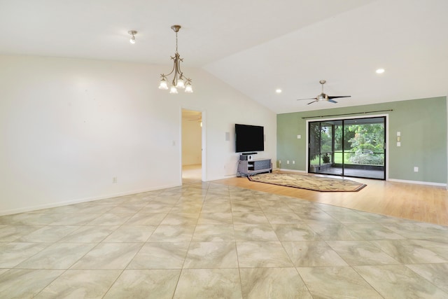 unfurnished living room with lofted ceiling, light hardwood / wood-style flooring, and ceiling fan with notable chandelier