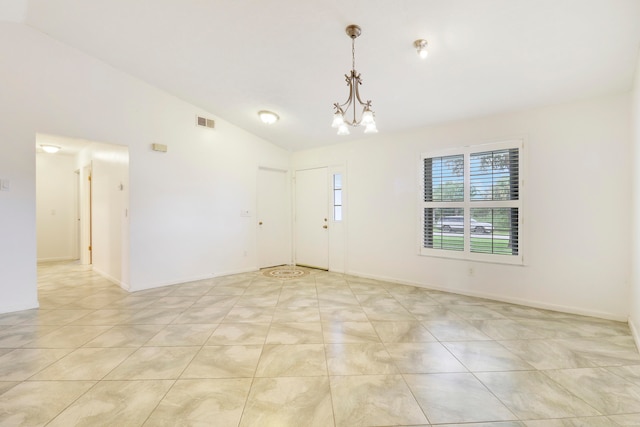 unfurnished room featuring light tile patterned flooring, lofted ceiling, and a chandelier