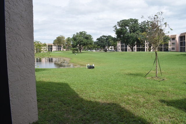 view of yard with a water view