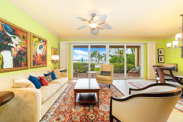 living room featuring crown molding, light tile patterned flooring, and ceiling fan with notable chandelier