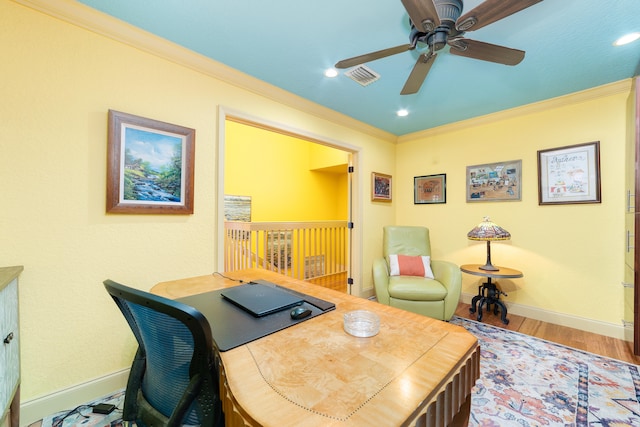 office area featuring ornamental molding, hardwood / wood-style floors, and ceiling fan