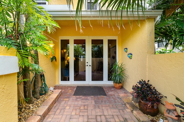 doorway to property featuring french doors