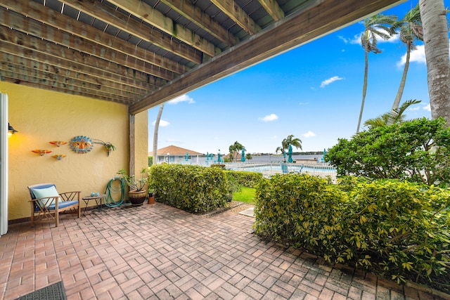 view of patio / terrace with a pool