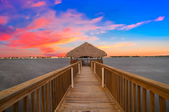 dock area with a water view and a gazebo