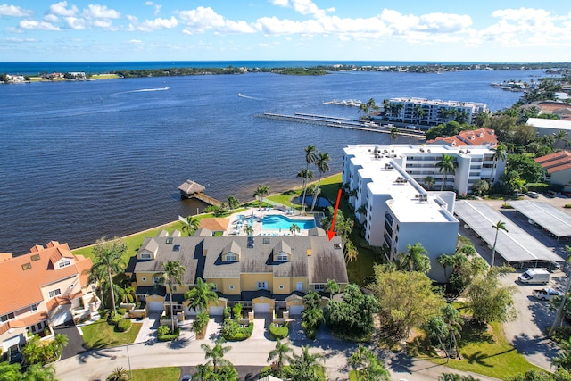 birds eye view of property featuring a water view