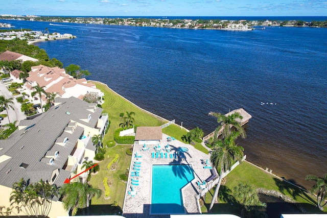 birds eye view of property featuring a water view