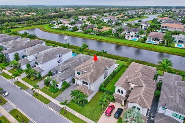 bird's eye view with a water view