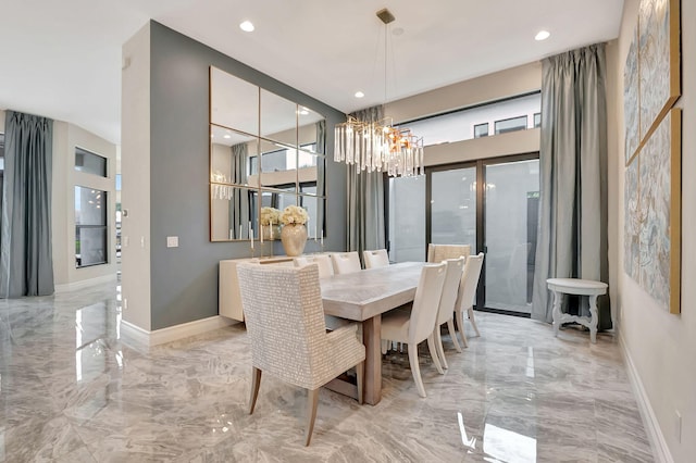 dining space featuring a chandelier