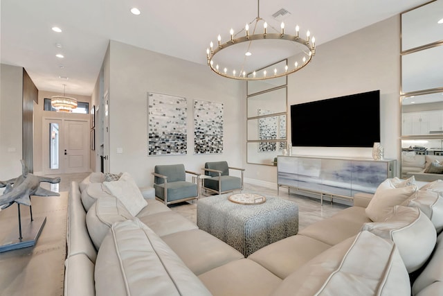 living room featuring an inviting chandelier