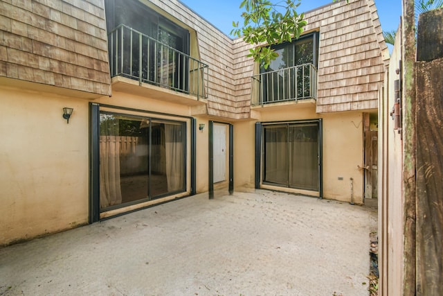 back of house featuring a patio area