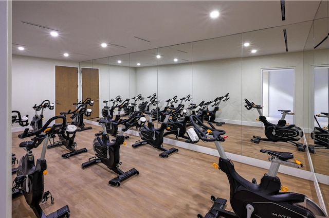 gym with light wood-type flooring