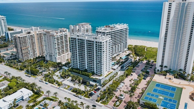 aerial view featuring a water view and a view of the beach