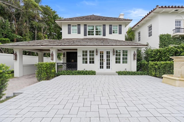 view of front of property with a carport