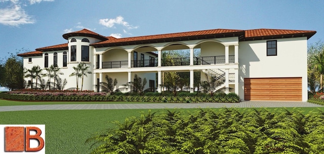 view of front facade with a front lawn and a balcony