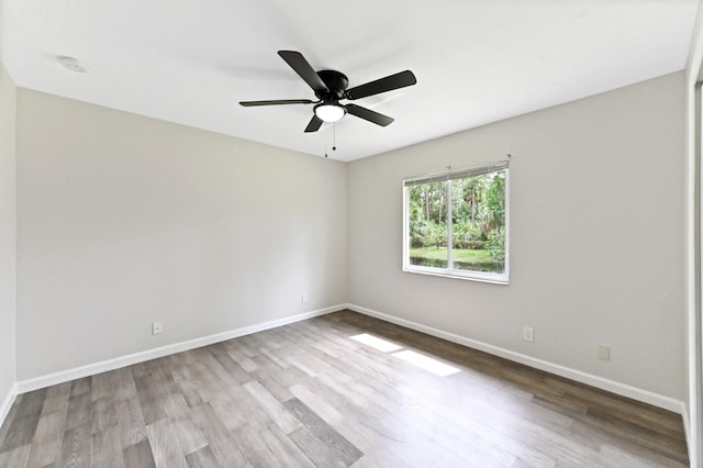 unfurnished room featuring ceiling fan and light hardwood / wood-style flooring