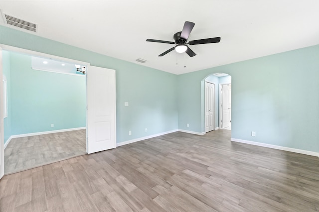 unfurnished bedroom featuring light hardwood / wood-style floors and ceiling fan